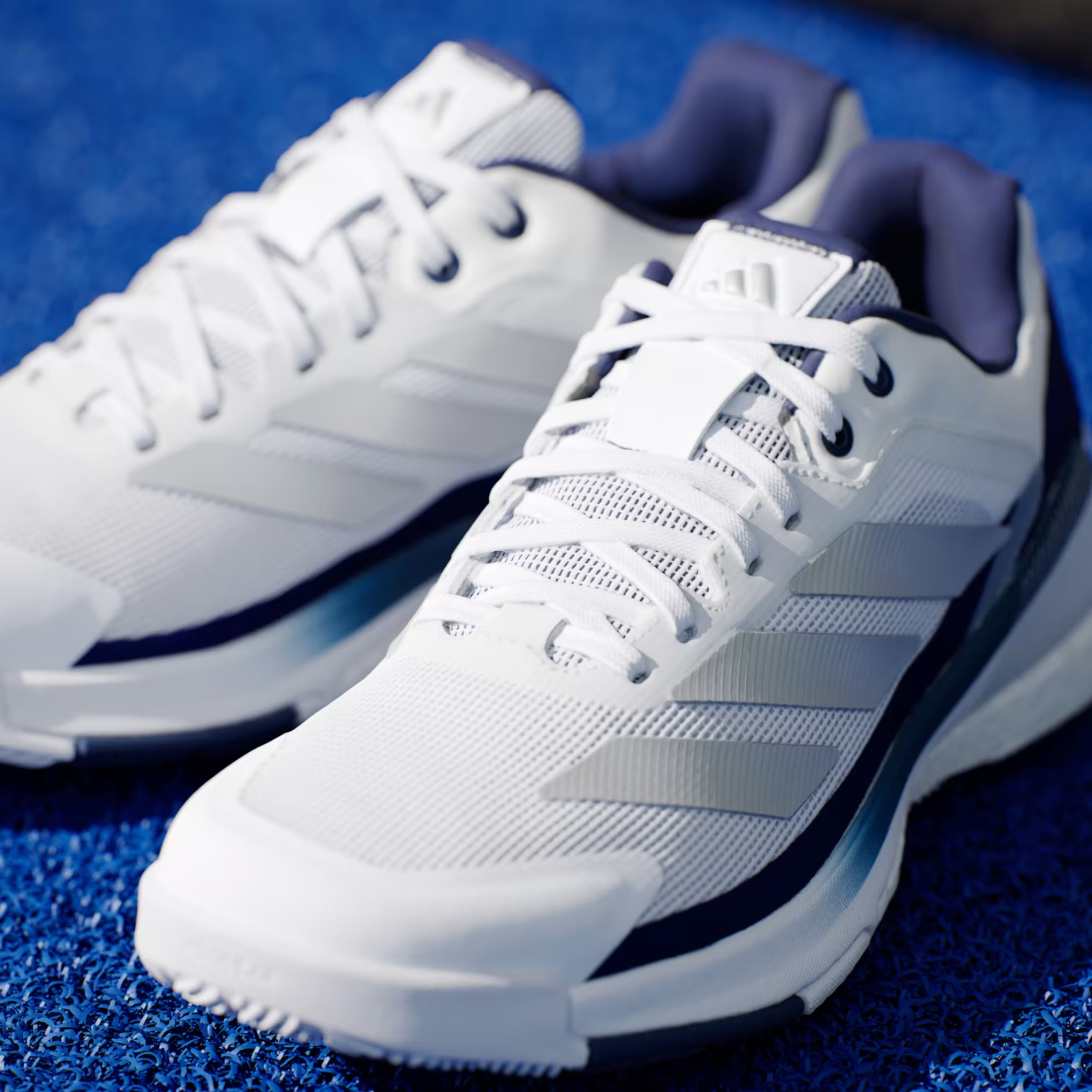 Adidas Crazyquick Boost Cloud White padel shoe, angled front and toe view