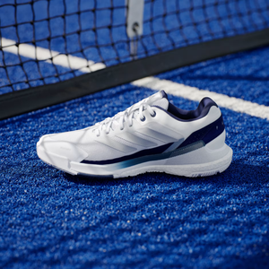 Adidas Crazyquick Boost Cloud White padel shoe, inner side view by the net