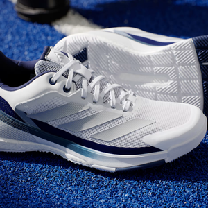 Adidas Crazyquick Boost padel shoe, close-up of the Dark Blue heel and three stripes