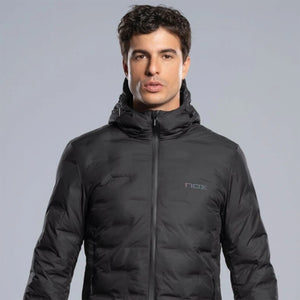 Nox Team quilted jacket in black, front view worn by a male model